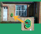 Image of the defibrillator on the Village Hall Wall